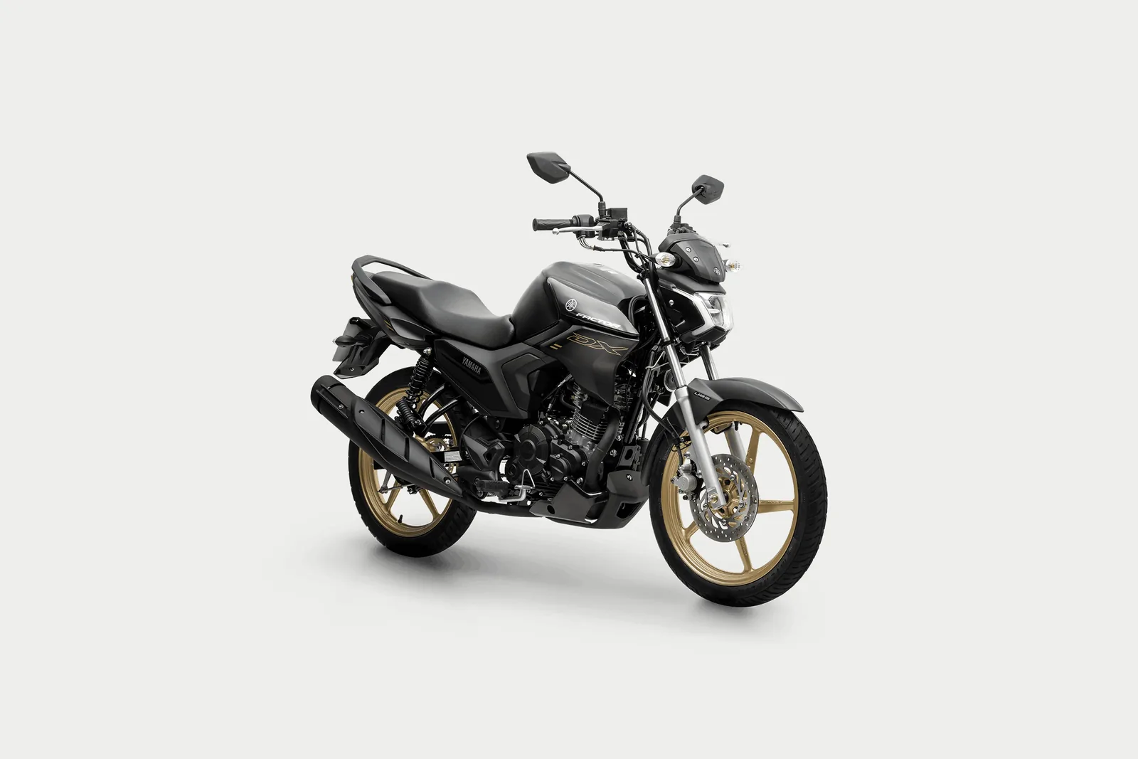 Foto oficial Yamaha: Factor DX 150 preta com rodas douradas, em três quartos de frente, sobre fundo cinza-claro.
